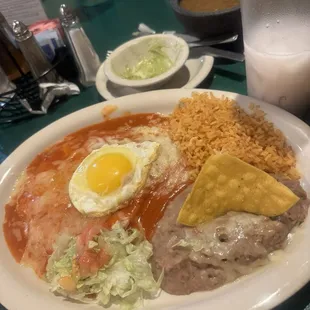 Red baked chicken enchiladas