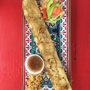 Machete, with rice, beans, and avocado salad.