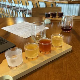 Ice wine flight in the foreground and dry red in the background. Tour de France stage 1 on the iPad