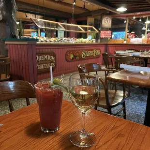 wo glasses of wine on a table