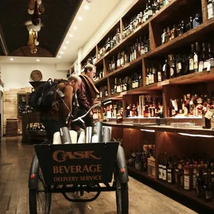 a horse and carriage in a liquor shop