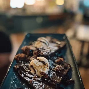 Chocolate Brownie with homemade Bourbon Ice Cream + Bacon + Candied Pecans