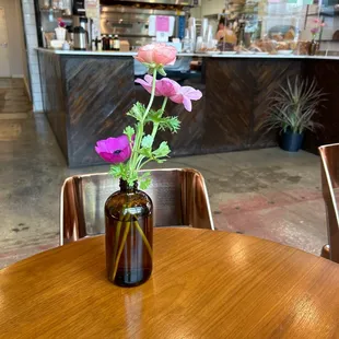 a vase of flowers on a table