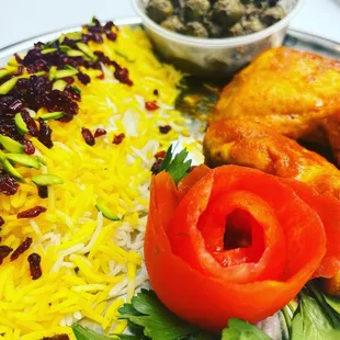 a plate of food with rice and vegetables