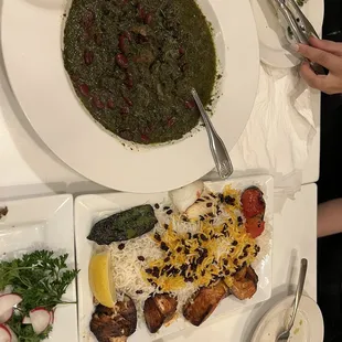 Gormeh sabzi and salmon kabob with zeresht polo