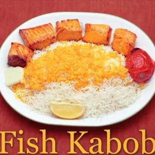 a plate of fish and rice