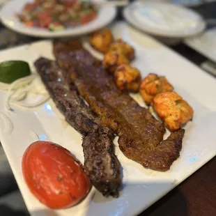 a plate of meat and vegetables