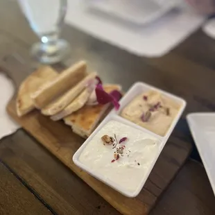 a plate of food and a glass of water