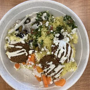 Falafel bowl with couscous (looked nicer but I tipped the bag when walking)