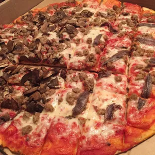 Half sausage&amp;mushroom other half sausage &amp; anchovy.