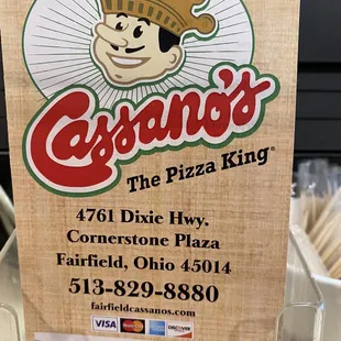 a sign for the pizza king