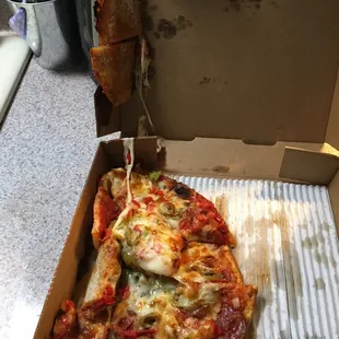 Our pizza was all smashed up in the box and stuck to the lid. We will never go here again! They don't seem to care about customer service.