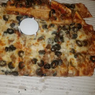 a slice of pizza in a box