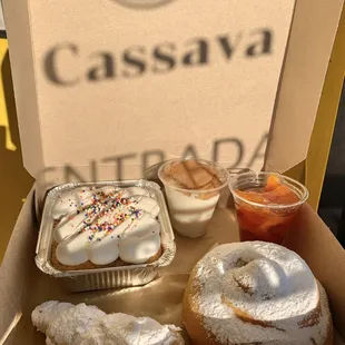 a box of pastries and condiments
