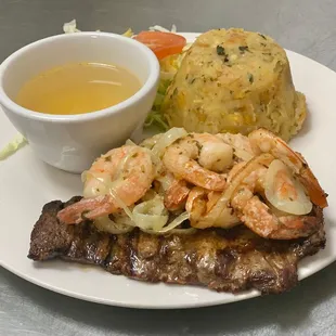 Skirt steak w/ mofongo and chicken broth. Add garlic shrimp. (Churrasco)