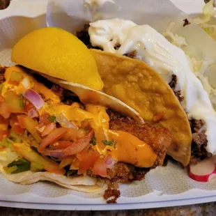Baja Fish Taco (L) and Oakland Taco, takeout