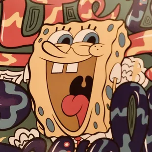 a cartoon spongebob with his tongue out