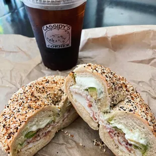 Desi Sandwich on an Everything Bagel with a Cold Brew