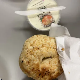 a bagel and a cup of yogurt