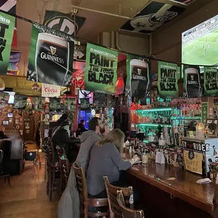 people sitting at the bar