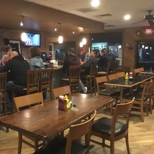 people sitting at the bar