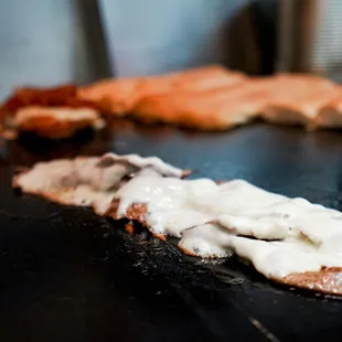 a close up of the meat on the grill