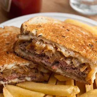 a grilled cheese sandwich and french fries