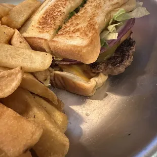 Grilled cheese burger with fries