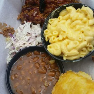 Lunch is served. Bbq with coleslaw, Mac and cheese, baked beans and cornbread!
