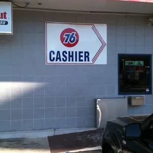 a car parked in front of a store