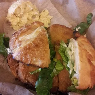 Crab cake sandwich on croissant w/potato salad!