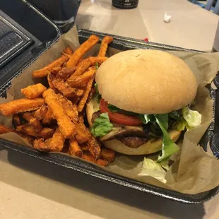Veggie burger with sweet potato fries