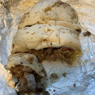 Carne asada burrito..amazingly delicious little green chile &amp; cheese &amp; the meat is very moist.The appearance is deceiving. Ck them out!!!!