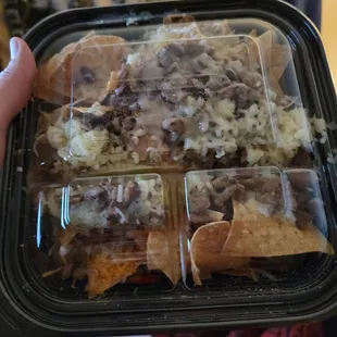 Tiny little thing of nachos for 17 bux and forgot the guac and sour cream place is a joke will not be back