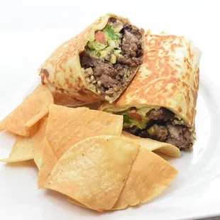 a burrito and chips on a plate