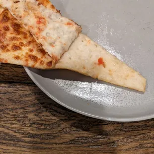 Cheese pizza, but the sauce was forgotten