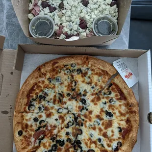 Pepperoni and black olive medium pizza. Large Italian salad.