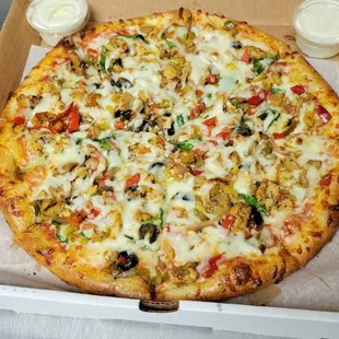 a pizza in a cardboard box