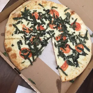 a whole pizza in a box
