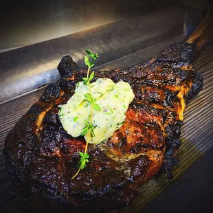 Tomahawk with herbed butter