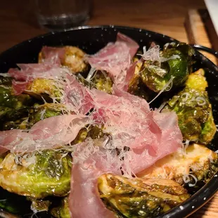 Roasted brussels sprouts and ham slices.