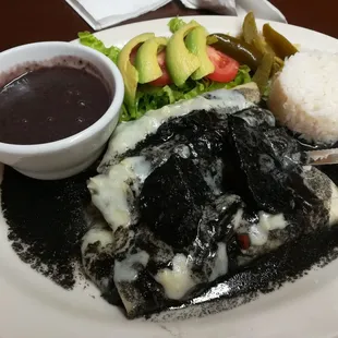 Black chicken enchiladas plate (~$16).