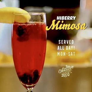 Hiberry: Hibiscus, lemonade, homemade blueberry syrup with a lemon wedge
