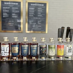 a row of bottles of spirits