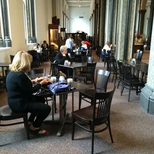 a woman sitting at a table