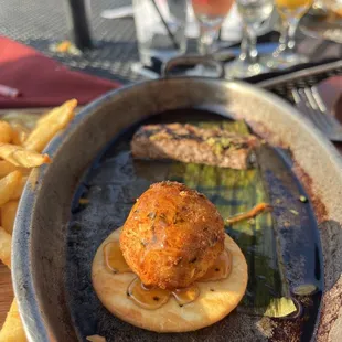 Fried goat cheese. Sirloin steak in background.