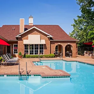 Vacation-style pool with lounge seating