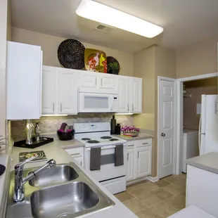 Bright and airy kitchens with mosaic tile backsplash and kitchen pantries