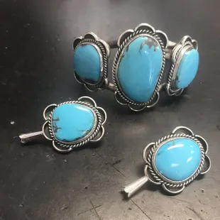 Custom made earrings and bracelet made to match customer's squash blossom necklace.