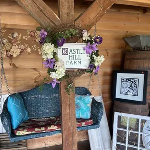 a swing with flowers on it